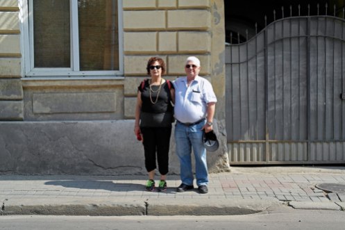 Arthur Rindner with his girlfriend Rina in front of the house where he was born